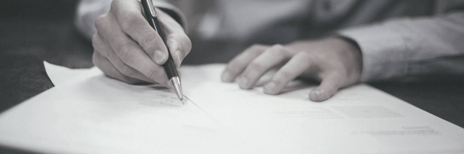 Hand writing on a paper document