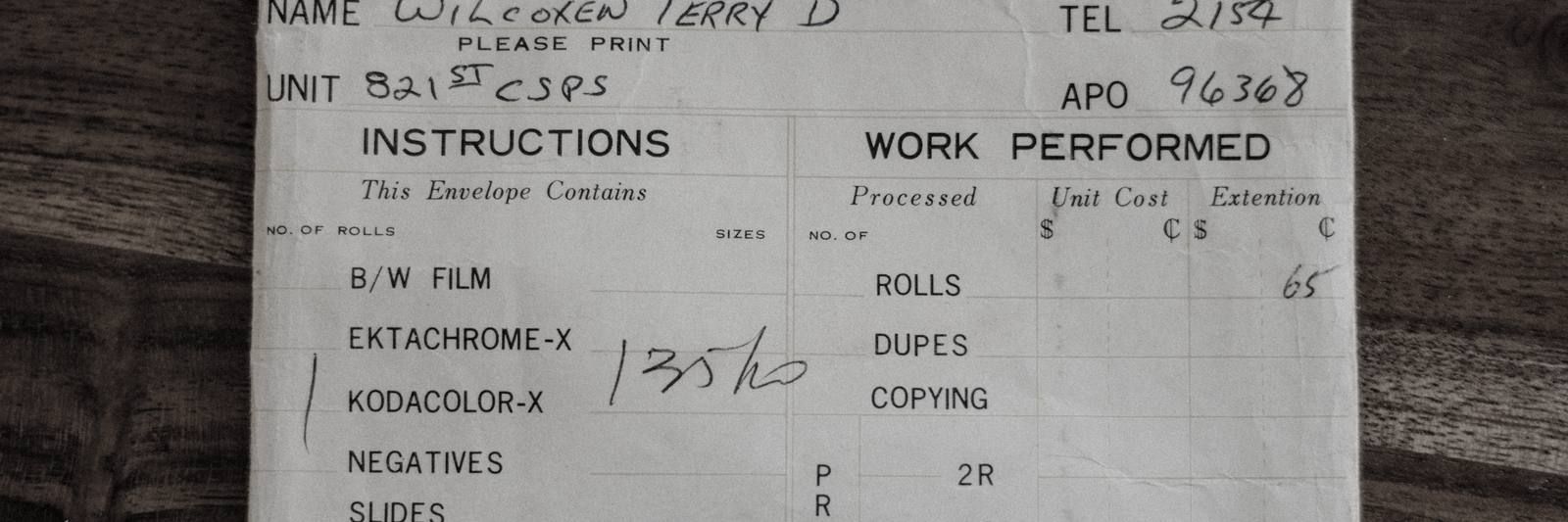 A receipt sitting on top of a wooden table